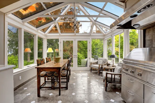 A stunning view of a luxurious sunroom.